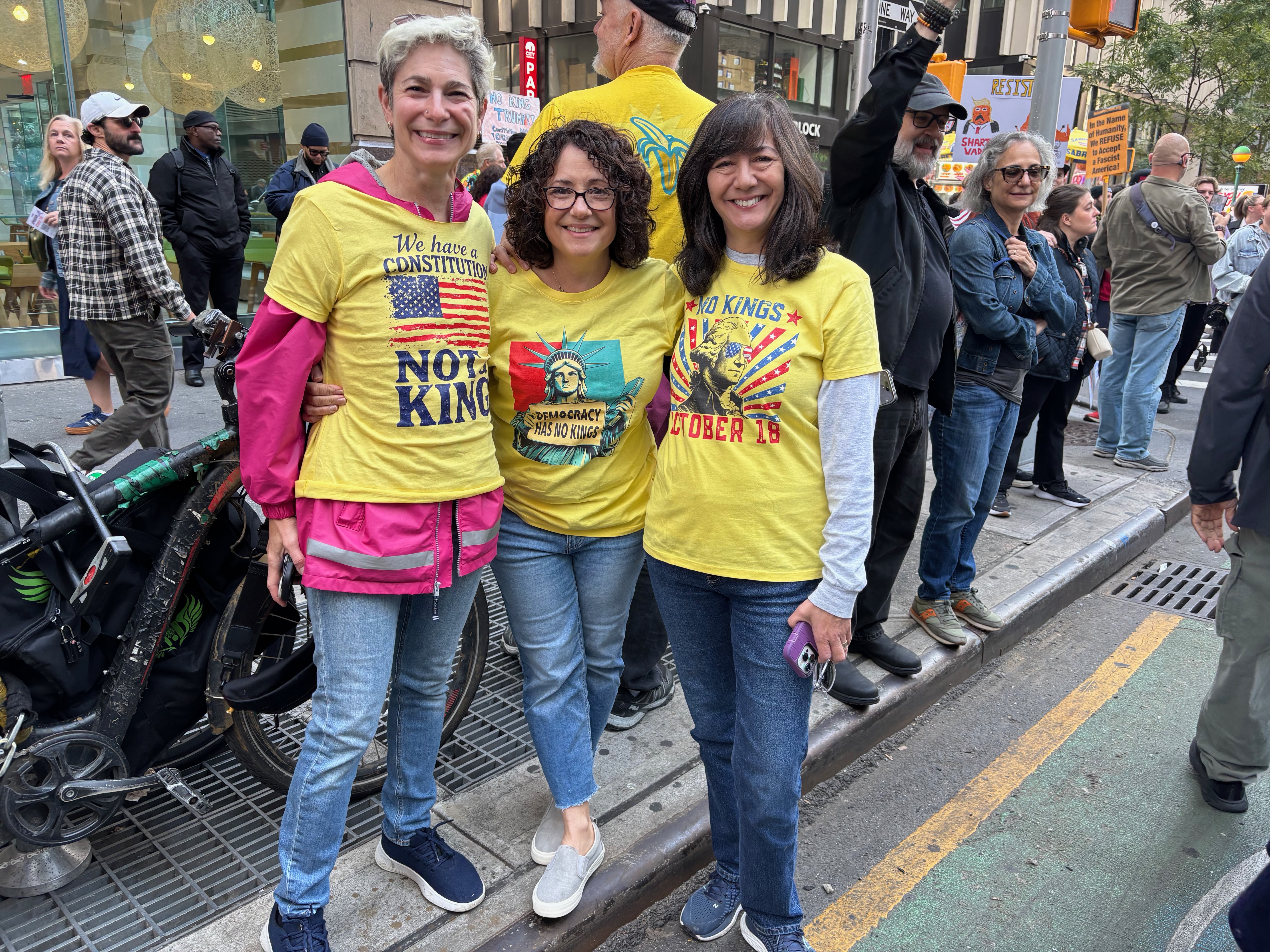 Three women protestors. No Kings October 18